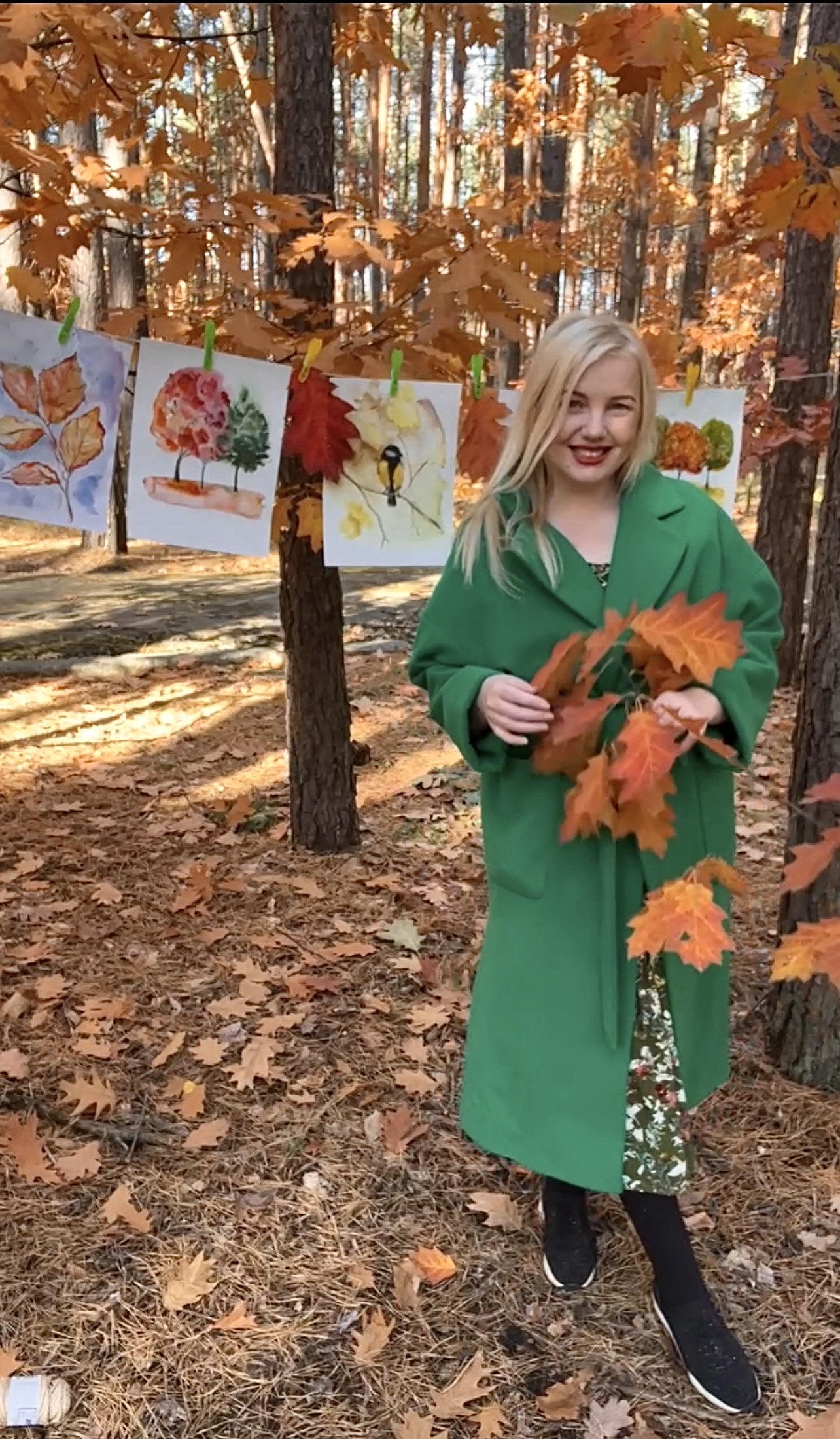 Marina Stognieva during an autumn open-air art project in Kyiv